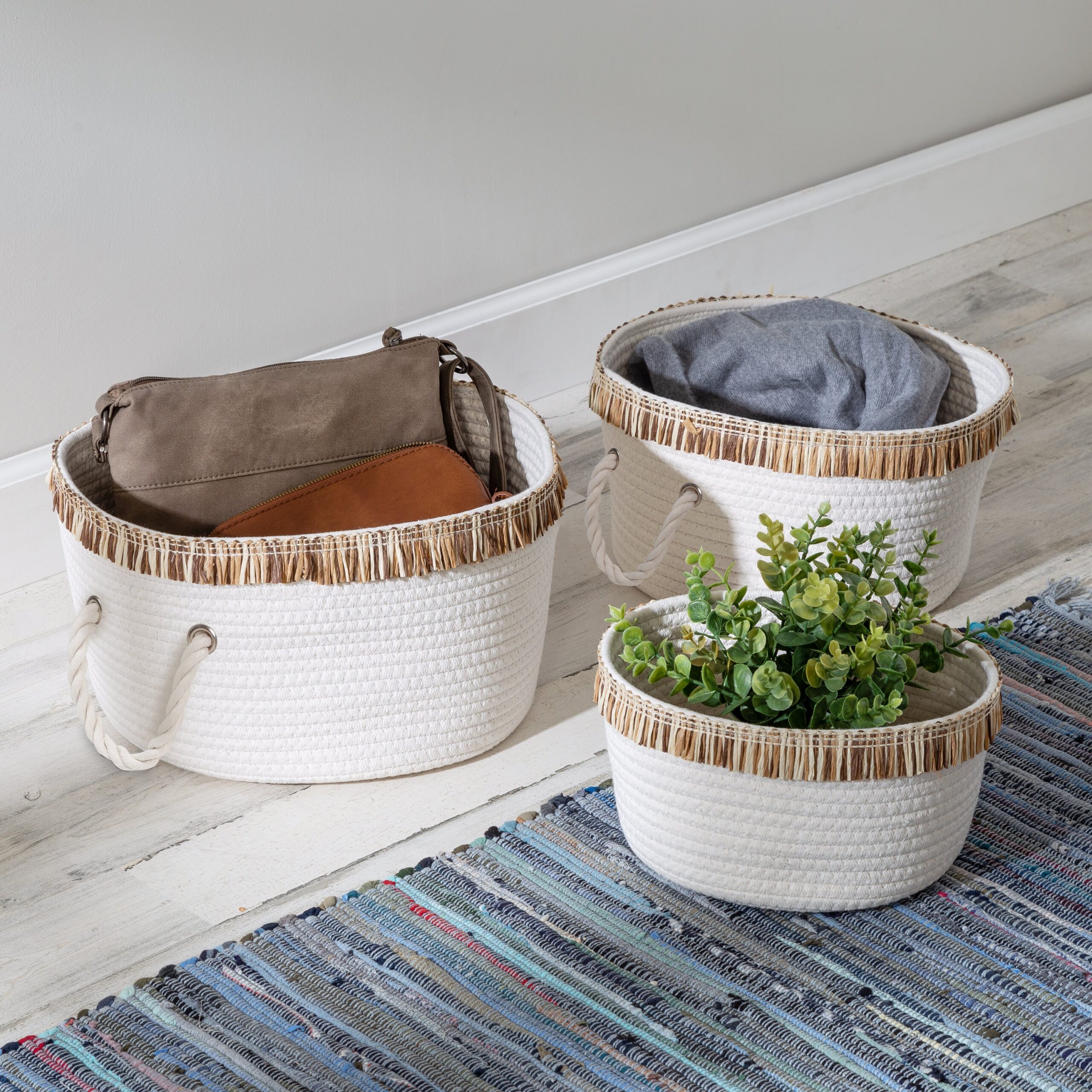 white/natural cotton rope nesting baskets with fringe (set of 3) white/natural cotton rope nesting baskets with fringe (set of 3)
